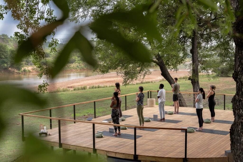 A morning yoga session on a riverside deck, Sashwa River of Stars